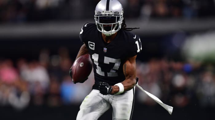Nov 13, 2022; Paradise, Nevada, USA; Las Vegas Raiders wide receiver Davante Adams (17) runs the ball for a touchdown against the Indianapolis Colts during the second half at Allegiant Stadium. Mandatory Credit: Gary A. Vasquez-USA TODAY Sports